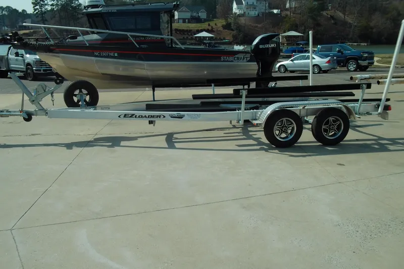 Slide: The Image of 2025 Stabicraft 2250 Ultra Centrecab boat on trailer, parked outdoors. - 30