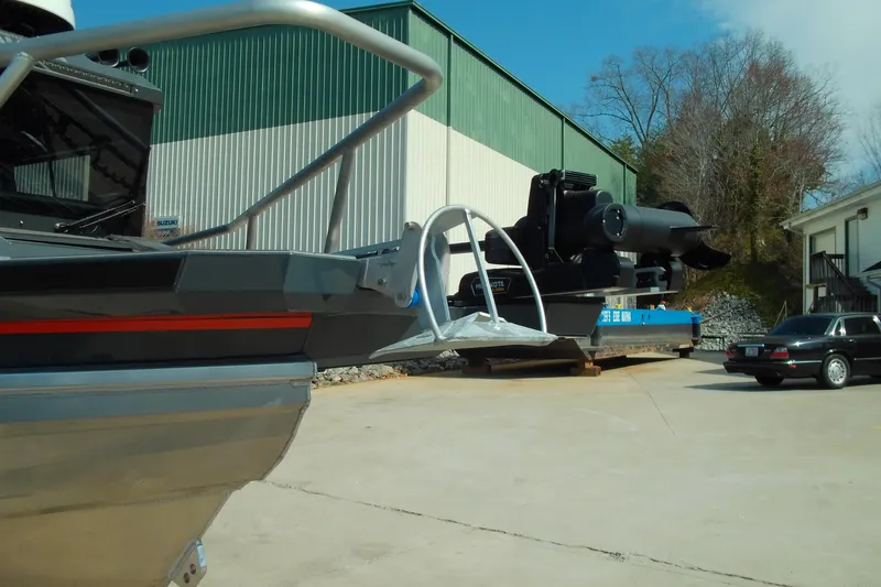 Slide: The Image of 2025 Stabicraft 2250 Ultra Centrecab boat at a dockside facility. - 4