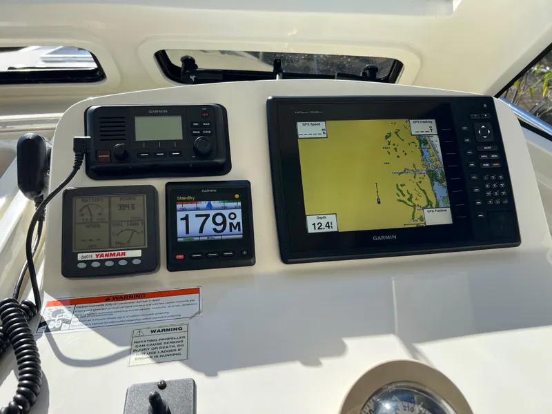 Slide: The Image of Marlow Pilot 31 dashboard with Garmin navigation system, 2016 model. - 17