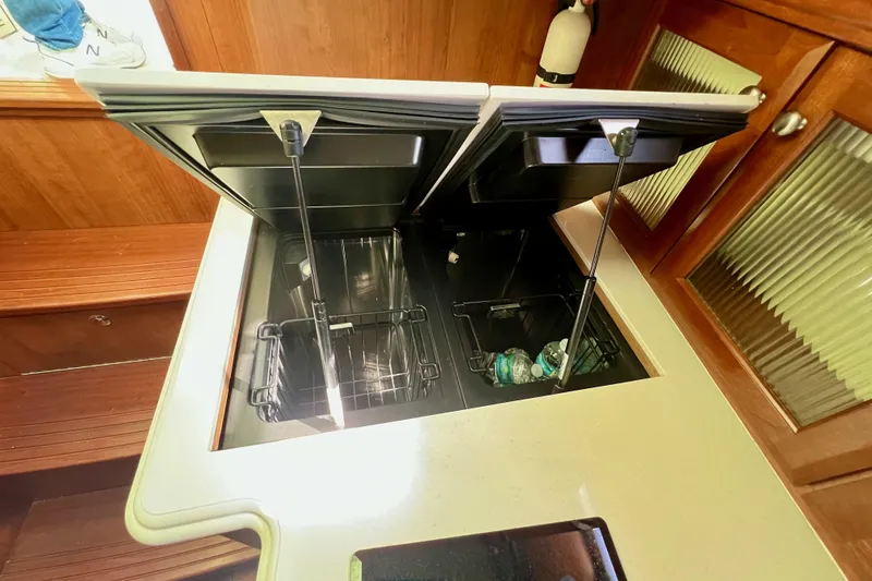 Slide: The Image of Marlow Pilot 31 Pilot 2016 yacht interior with open storage compartments. - 29