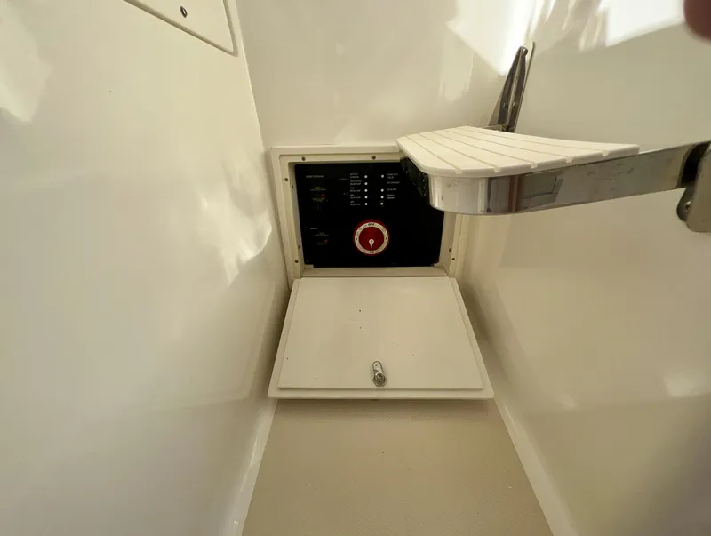 Slide: The Image of Marlow Pilot 31 control panel, 2016 model, featuring a red switch and white compartment. - 47