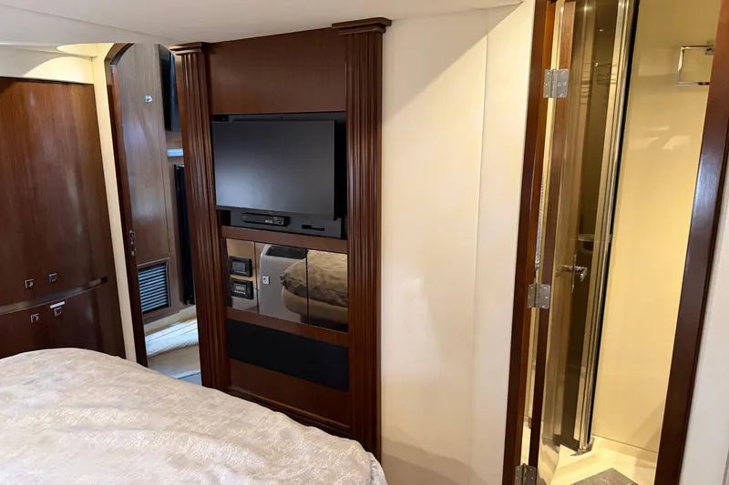 Slide: The Image of Interior of 2011 Cruisers Yachts 540 Sports Coupe with TV and bathroom. - 55