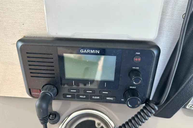 Slide: The Image of Garmin marine radio on 2011 Cruisers Yachts 540 Sports Coupe dashboard. - 13