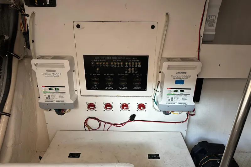 Slide: The Image of Electrical panel and chargers in 2011 Cruisers Yachts 540 Sports Coupe engine room. - 40