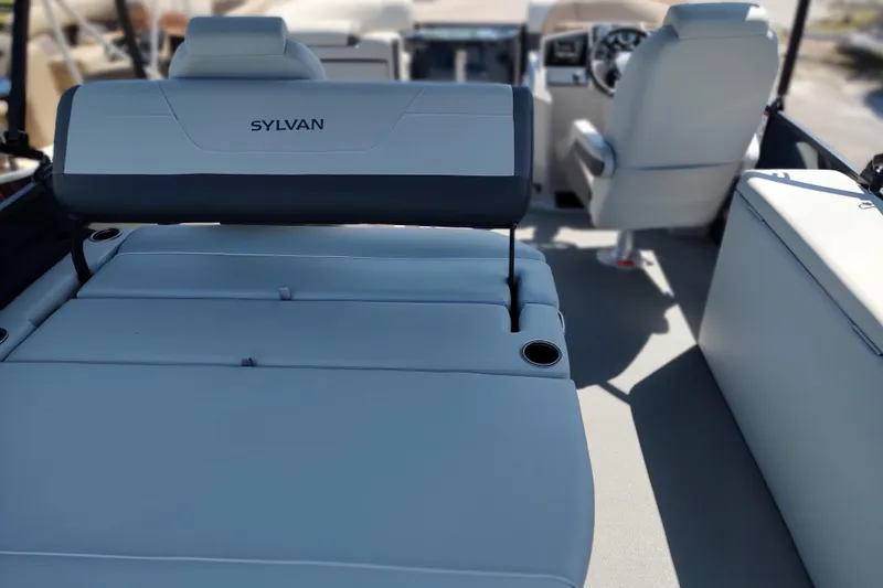 Slide: The Image of Interior of 2026 Sylvan MIRAGE X1 CLZ DH boat with plush seating. - 12