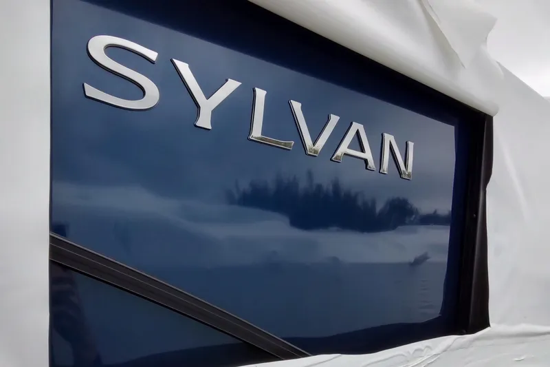 Slide: The Image of Sylvan MIRAGE X1 CLZ DH 2026 emblem on blue background. - 2