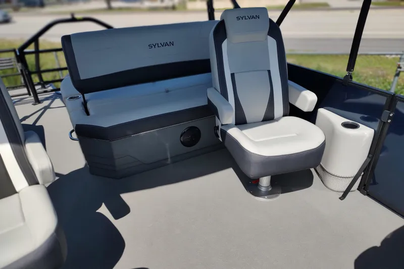 Slide: The Image of Interior of 2026 Sylvan MIRAGE X1 CLZ DH boat with seating and cup holder. - 8