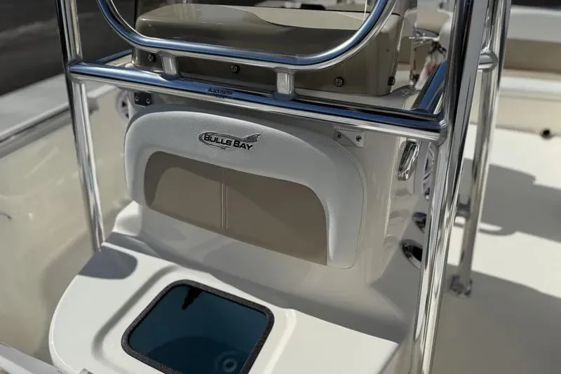Slide: The Image of 2026 Bulls Bay 230 Center Console boat interior with console and seating. - 13
