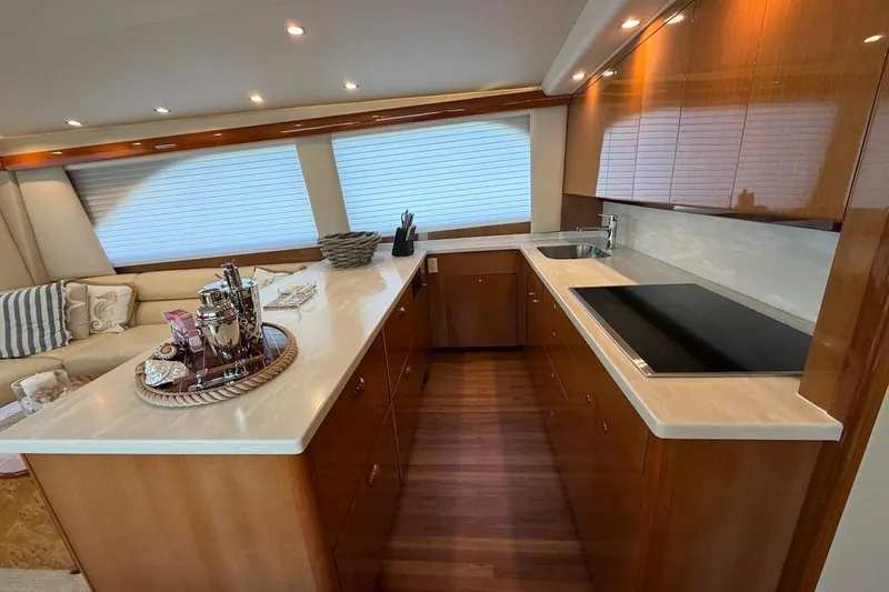Slide: The Image of Luxurious kitchen interior of 2004 Viking 56 Convertible yacht with modern amenities. - 21
