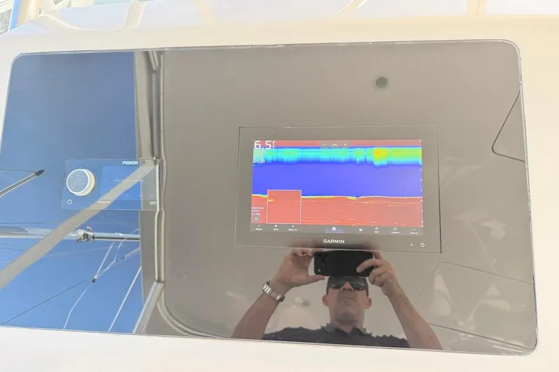 Slide: The Image of Garmin display on 2004 Viking 56 Convertible yacht dashboard, showing sonar data. - 60