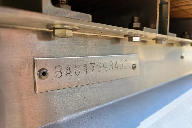 Slide: The Image of 2026 Bentley Pontoons Legacy 220 Swingback serial number plate close-up. - 21