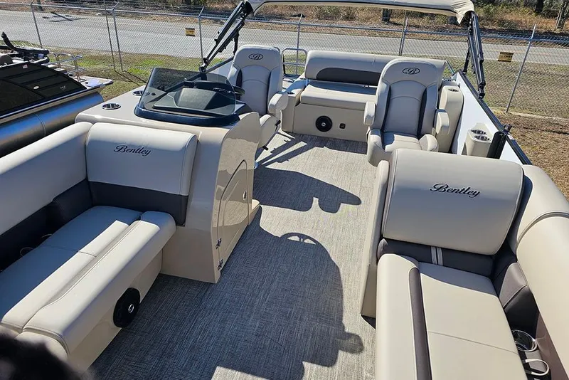 Slide: The Image of 2026 Bentley Pontoons Legacy 220 Swingback interior with luxurious seating and modern design. - 9