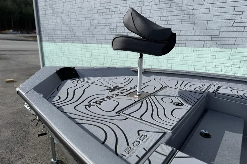 Slide: The Image of 2026 Xpress H20B Bay boat deck with seat, featuring stylish design and branding. - 8