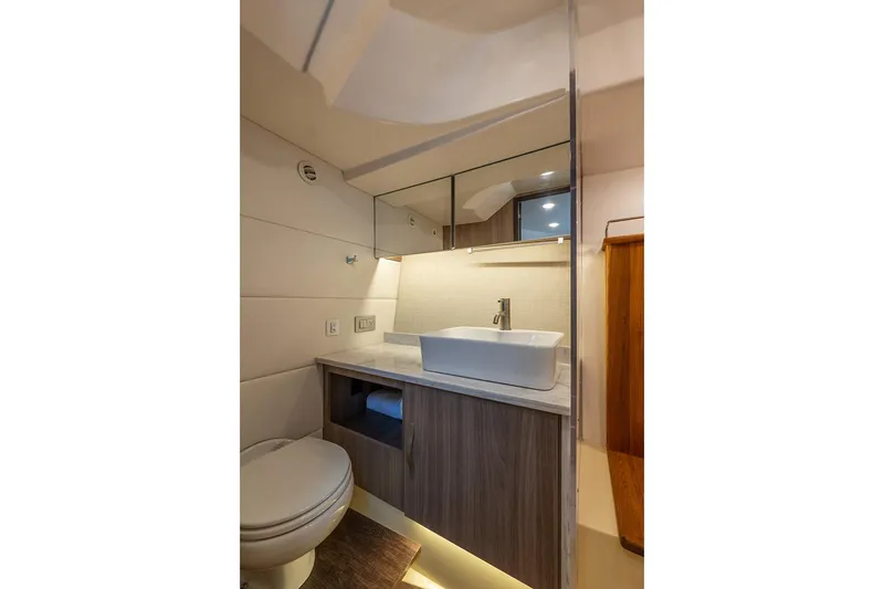 Slide: The Image of Manufacturer Provided Image: 2020 Regal 38 SAV yacht bathroom with modern sink and toilet - 23