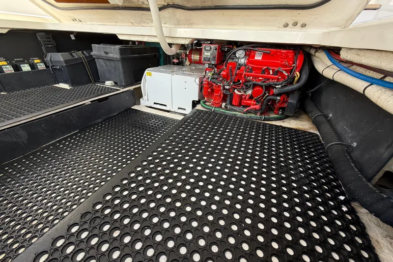 Slide: The Image of Engine room of 2020 Regal 38 SAV with visible red engine components. - 30