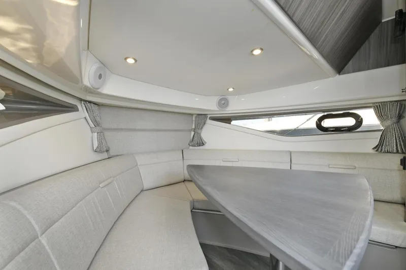 Slide: The Image of Interior of 2022 Sea Ray Sundancer 320 yacht with elegant seating and modern design. - 20
