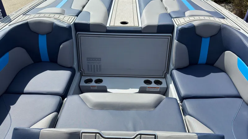 Slide: The Image of Interior of 2022 MasterCraft XT24 with blue upholstery. - 11