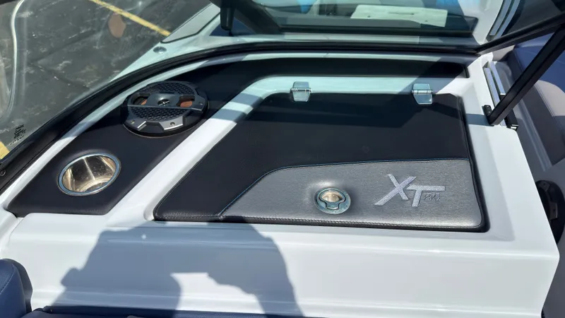 Slide: The Image of MasterCraft XT24 2022 dashboard with speaker and logo. - 21