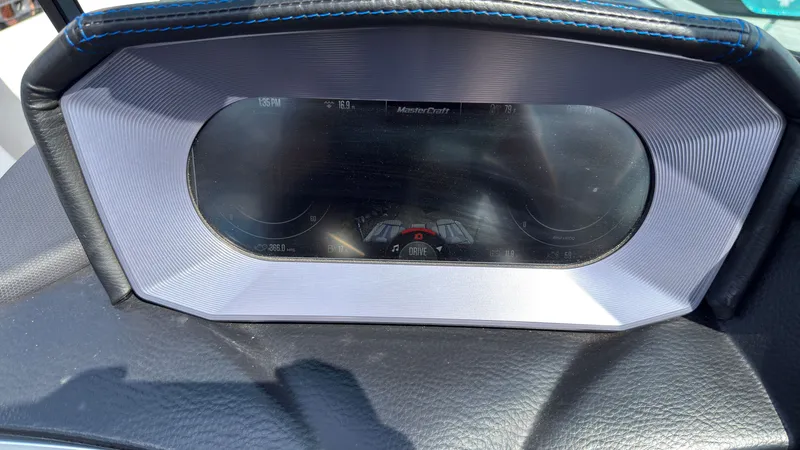 Slide: The Image of MasterCraft XT24 2022 dashboard with digital display. - 27