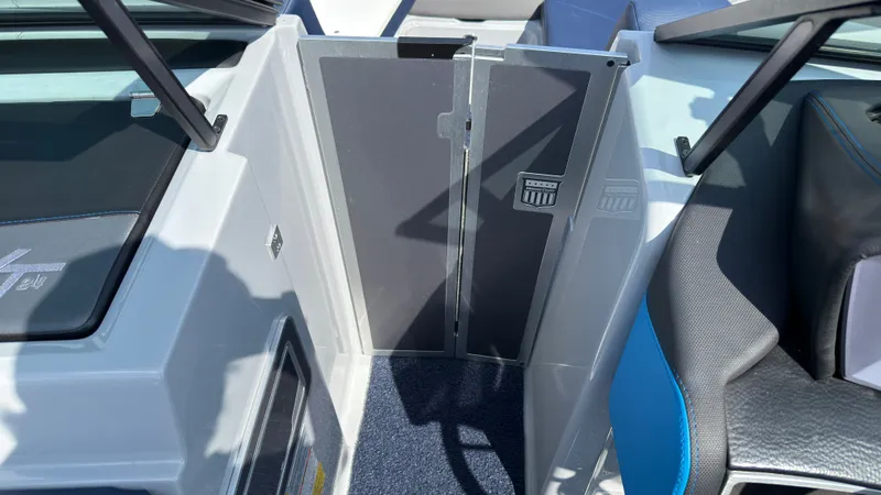 Slide: The Image of Interior of 2022 MasterCraft XT24 with blue accents. - 33