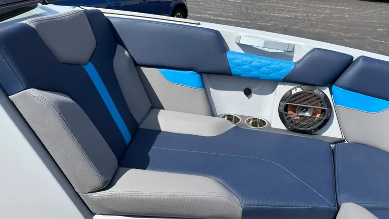 Slide: The Image of Interior of 2022 MasterCraft XT24 with blue and gray upholstery. - 36