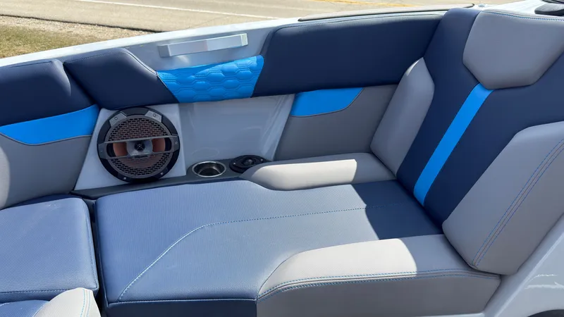 Slide: The Image of Interior of 2022 MasterCraft XT24 with blue and gray upholstery. - 38