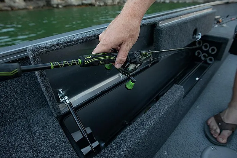 Slide: The Image of Manufacturer Provided Image: 2023 Lowe Fishing Machine 1675 SC rod storage compartment with fishing rod. - 27