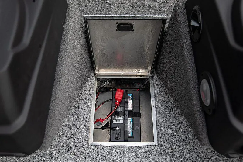 Slide: The Image of Manufacturer Provided Image: 2023 Lowe Fishing Machine 1675 SC battery compartment with secure storage. - 28