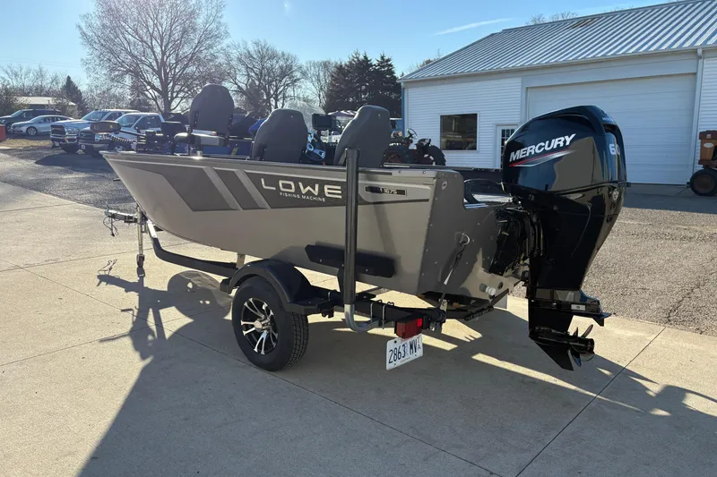 Slide: The Image of 2023 Lowe Fishing Machine 1675SC boat with Mercury engine on trailer. - 3