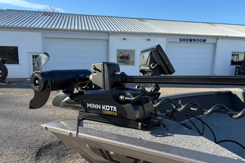 Slide: The Image of Minn Kota Terrova motor on 2023 Lowe Fishing Machine 1675SC boat outside showroom. - 9