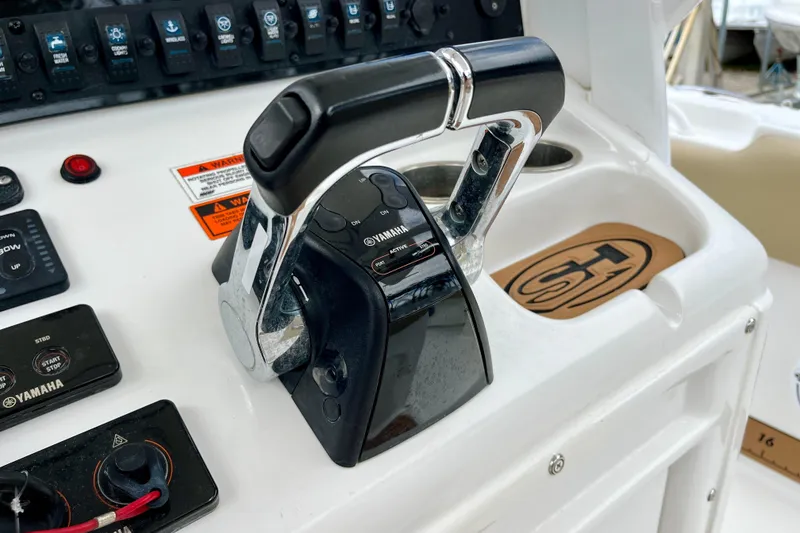 Slide: The Image of Close-up of Yamaha throttle controls on 2018 Sea Hunt Gamefish 27 Coffin Box boat. - 11