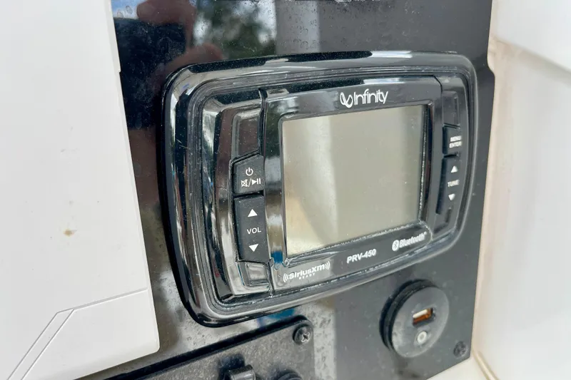 Slide: The Image of Infinity PRV-450 Bluetooth stereo system on 2018 Sea Hunt Gamefish 27 Coffin Box boat. - 12