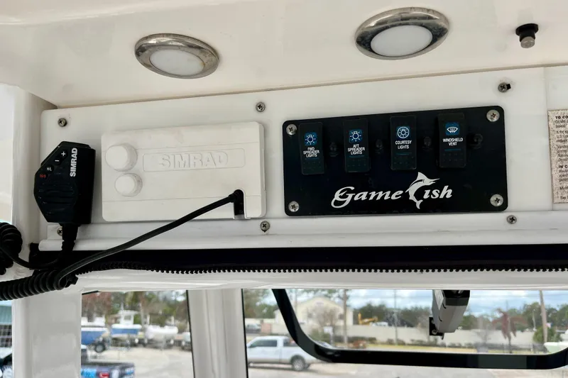 Slide: The Image of Control panel of a 2018 Sea Hunt Gamefish 27 Coffin Box boat with Simrad equipment. - 14