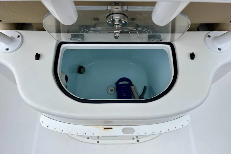 Slide: The Image of 2018 Sea Hunt Gamefish 27 Coffin Box interior with storage compartment. - 18