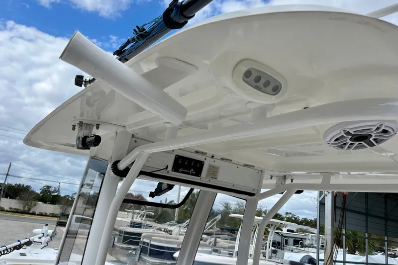 Slide: The Image of 2018 Sea Hunt Gamefish 27 Coffin Box boat interior with electronics and speaker system. - 20