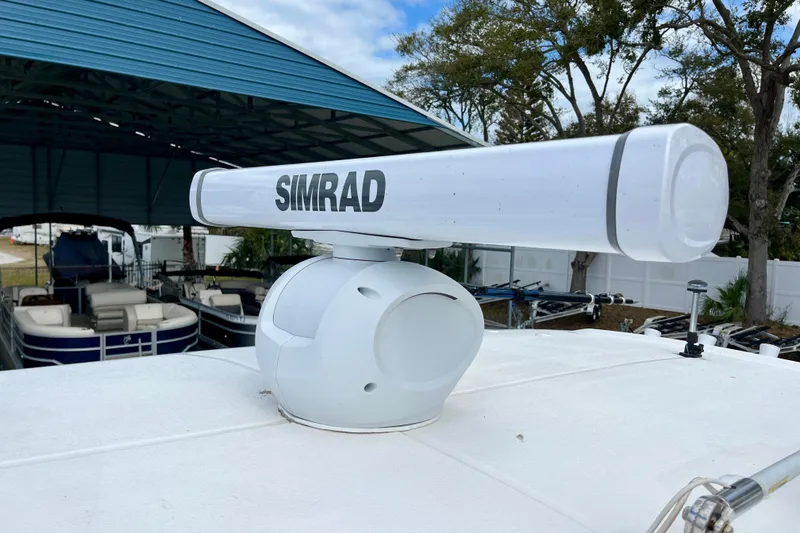 Slide: The Image of Simrad radar on 2018 Sea Hunt Gamefish 27 Coffin Box boat, docked under shelter. - 24