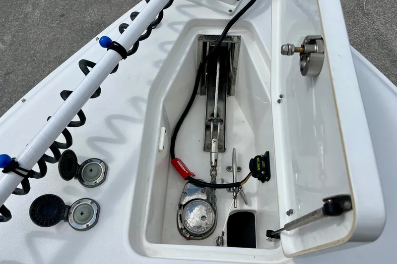 Slide: The Image of 2018 Sea Hunt Gamefish 27 Coffin Box anchor compartment with wiring and fittings. - 27