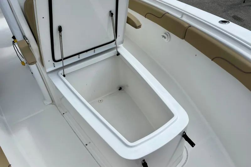 Slide: The Image of 2018 Sea Hunt Gamefish 27 Coffin Box, open storage compartment on deck. - 30