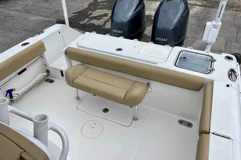 Slide: The Image of 2018 Sea Hunt Gamefish 27 Coffin Box boat interior with twin Yamaha 200 engines. - 32