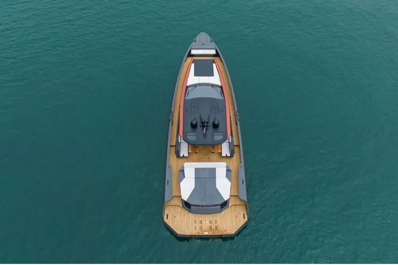 Slide: The Image of Aerial view of 2025 Maori 64 yacht on calm blue water. - 10