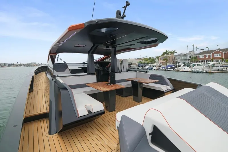 Slide: The Image of Luxury 2025 Maori 64 yacht with sleek design and spacious seating area. - 11
