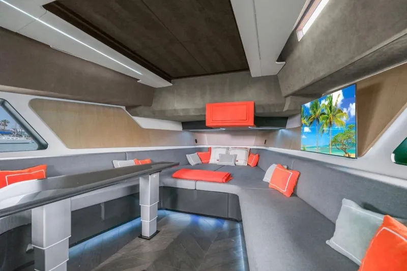 Slide: The Image of Luxurious interior of 2025 Maori 64 yacht with modern seating and tropical decor. - 34