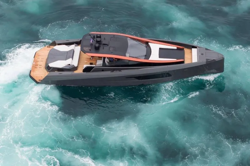 Slide: The Image of Luxury Maori 64 yacht cruising on turquoise waters, 2025 model. - 7