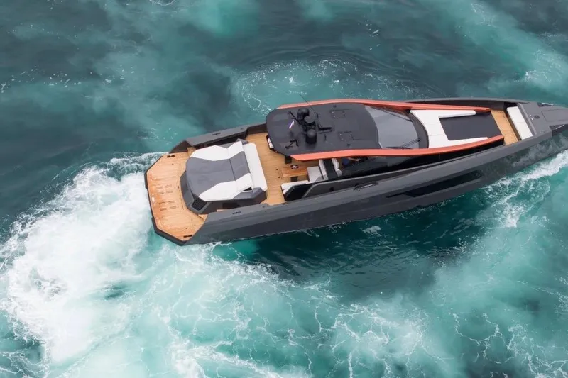 Slide: The Image of Luxurious 2025 Maori 64 yacht cruising through turquoise waters, showcasing sleek design and elegance. - 8