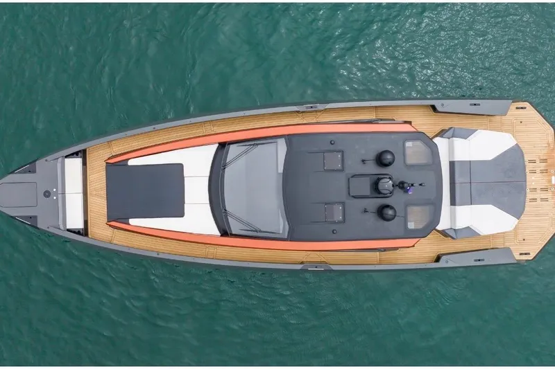 Slide: The Image of Overhead view of 2025 Maori 64 yacht on turquoise water. - 9