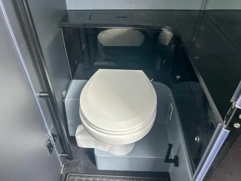 Slide: The Image of 2024 BRABUS Shadow 1000 ST bathroom interior with modern toilet design. - 14