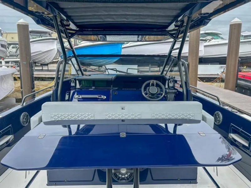 Slide: The Image of 2024 BRABUS Shadow 1000 ST luxury boat interior at marina. - 23