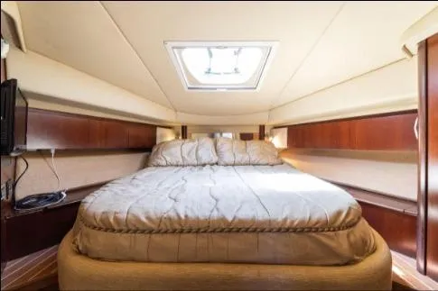 Slide: The Image of Luxurious cabin interior of 2005 Sea Ray 420 Sedan Bridge yacht. - 18