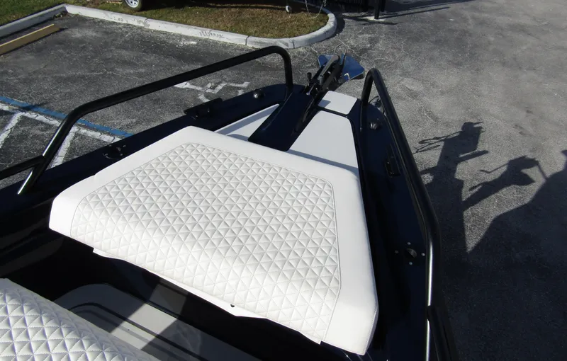 Slide: The Image of 2024 BRABUS Shadow 900 ST boat with quilted white seating detail. - 5