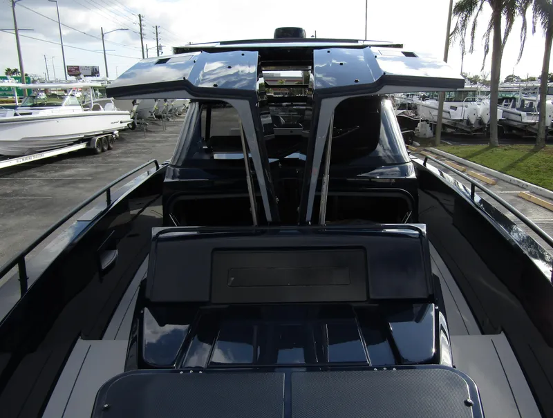 Slide: The Image of 2024 BRABUS Shadow 900 ST luxury boat with sleek design and open deck. - 7
